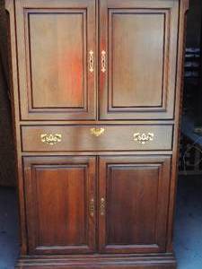 lot 14 image: Brown entertainment cabinet size 65 tall x 39 wide x 22 deep