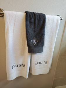 lot 12 image: Darling Homes Monogrammed Towels