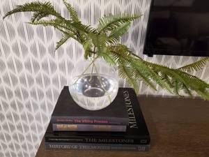 lot 49 image: Books & Faux Fern in Glass Vase