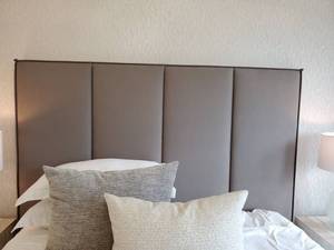 lot 84 image: King Upholstered Headboard Panel