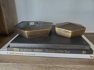 lot 97 image: Decorative Brass Discs & Books