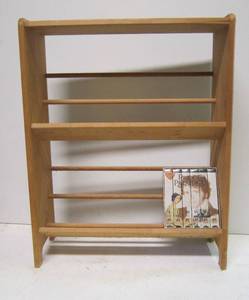 lot 748 image: Wooden Video Rack & Pride and Prejudice videos