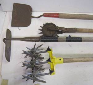 lot 800 image: Lawn aerators and spades