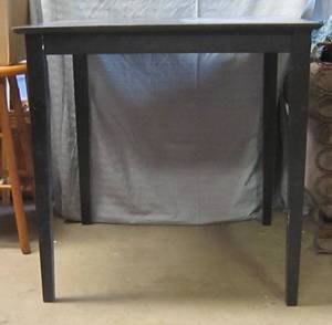 lot 802 image: Black dining table