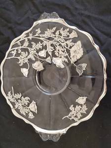 lot 23 image: Decorative Clear Plate with Silver Colored Accents