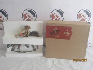 lot 9 image: NEW IN BOX PREMIUM QUALITY RED SHED TRADE MARK RIDING COWBOY STATUETTE&nbsp