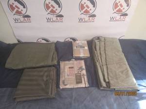 lot 86 image: TOTAL OF 9 PC HOME LINEN&nbsp&nbsp- SHOWER CURTAIN , DRAPES, CURTAINS KING PILLOW CASES , SATIN TABLE CLOTH&nbsp