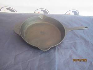 lot 221 image: 13 12 WOMAN CAST IRON SKILLET&nbsp