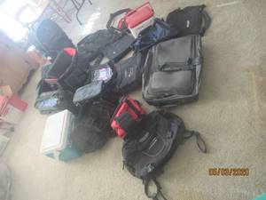 lot 338 image: TOTAL OF 17 BAGS&nbsp-COLEMAN COOLERS&nbsp-LAP TOP BAGS- SUITCASE-TOOL BAGS AND MORE SEE PICS