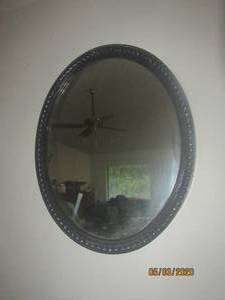 lot 369 image: ANTIQUE OVAL BLACK WOOD BUBBLE PATTERN FRAME WALL MIRROR&nbsp31 X 25&nbsp