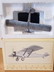 lot 55 image: AVON HISTORIC FLIGHT PEWTER PLANE COLLECTION RYAN NYP SPIRIT OF ST. LOUIS (NEW IN BOX)