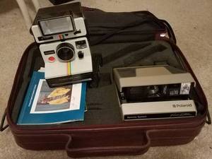 lot 69 image: VINTAGE POLAROID CAMERAS WITH CASE