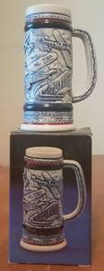 lot 155 image: VINTAGE AVON FLYING CLASSICS CERAMIC STEIN (NEW IN BOX)