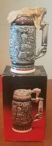 lot 156 image: VINTAGE AVON AGE OF THE IRON HORSE CERAMIC STEIN (NEW IN BOX)