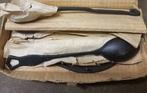 lot 243 image: CAST IRON SPOONS WALL DECOR