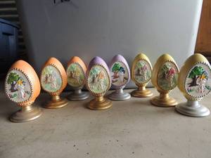 lot 449 image: 8 hand painted ceramic eggs on stands. Bunnies and houses decoration