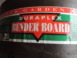 lot 466 image: Roll of lawn and garden bender board for edging around flower beds and trees