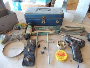 lot 434 image: 2 Solder guns, solder paste, lead free wire solder, all purpose tool NIP, empty blue tool box, 2 bags of button drippers and more