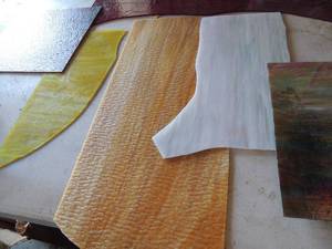 lot 436 image: Lot of different stain glass yellow 17x7,carmel 24x11,white 16x9,mary-go-round 11x12, purple 13x11 and 30x6