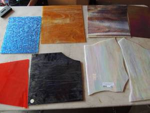 lot 437 image: All about stain glass Cotton candy 13x9 and 16x15, por red 12x8, marble 12x12, Carmel brown 12x13, bright blue 12x9, red,11x8,dark blue 12x12