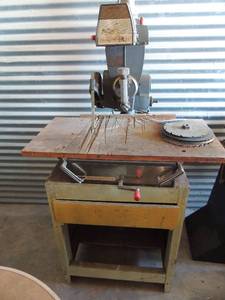 lot 419 image: Magna SAWSMITH Radial saw on table stand comes with assorted blades