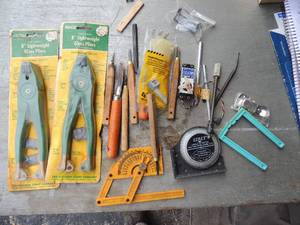 lot 395 image: Glass tool lot- angel meter glass pliers, sockets, clamps, zip ties small wood chisels