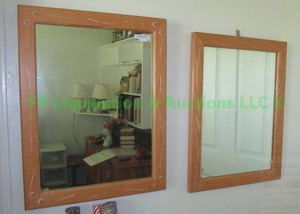 lot 13 image: Matching oak framed wall mirrors, each measures 22 x 28