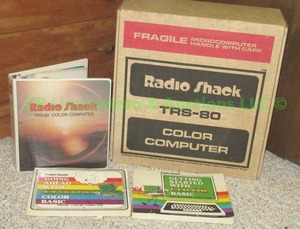 lot 14 image: Retro Radio Shack TRS-80 color computer console in original box with manuals