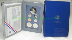 lot 215 image: Silver statue of Liberty 100th year commemorative coin set with COA