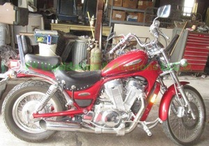 lot 3 image: Suzuki VS800 Intruder motorcycle 1997 only 3247 miles like new VIN JS1VS52A0V2101001. clear title