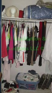 lot 48 image: Contents of closet including assorted clothes and more as shown