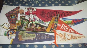 lot 54 image: Vintage sports pennants including Texas Tech and patches