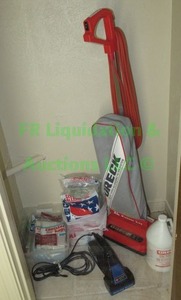 lot 55 image: Oreck XL9300vacuum and accessories plus Hoover hand vac