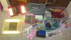 lot 79 image: Assorted vanity supplies including curling irons and more