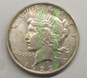 lot 228 image: Silver 1923 peace dollar