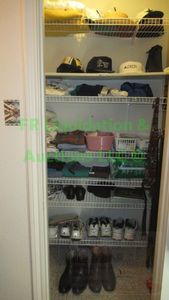 lot 75 image: Contents of closet including mens clothing and shoes