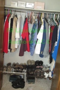 lot 60 image: Contents of closet including ladies clothes and shoes