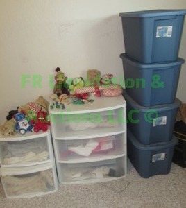 lot 58 image: Assorted clothes in totes and stuffed animals