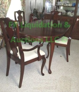 lot 191 image: Cherry wood cordovan stained dining table and chair set