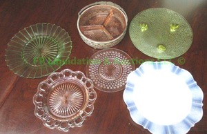 lot 178 image: Uranium oxide serving plates and pink depression glass plus