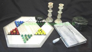 lot 249 image: Solid marble items including Chinese checkers board, candle sticks and more as shown