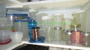 lot 299 image: Assorted plastic storage containers as shown
