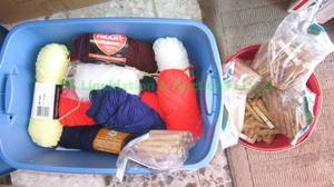 lot 316 image: Tote full of Yarn skeens and clothing pins