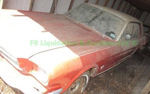 lot 374 image: 1965 Ford Mustang body with original straight 6 engine and 3 speed manual trans. Rear has damage. as shown. title included