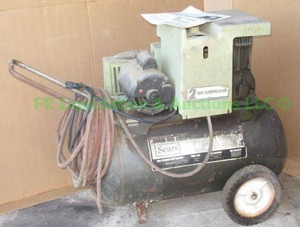 lot 377 image: Sears portable air compressor model 106.175781