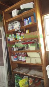 lot 423 image: Storage shelf plus contents as shown