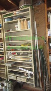 lot 424 image: Storage shelf plus contents as shown