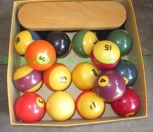 lot 439 image: Vintage Sears pool balls and felt brush