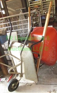 lot 464 image: Wheel barrows 2 total plus wheel barrow hangers