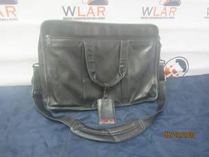 lot 39 image: TUMI BLACK LEATHER EXPANDABLE LAPTOP BRIEF&nbsp